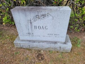 A grave marker for hoag in the cemetery.